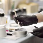 Cosmetic laboratory testing ingredients with pipette and containers for CPSR safety assessment and formulation analysis