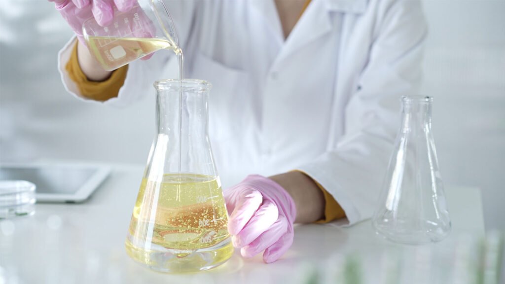 Cosmetic laboratory testing formulation with pipette and glassware for safety assessment and CPSR compliance