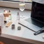 Cosmetic brand owner using laptop to access Digital Product Passport system for EU CPSR compliance